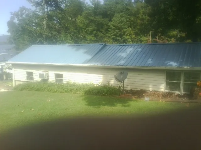 Blue metal roof running the length of a single story home in Sabillasville